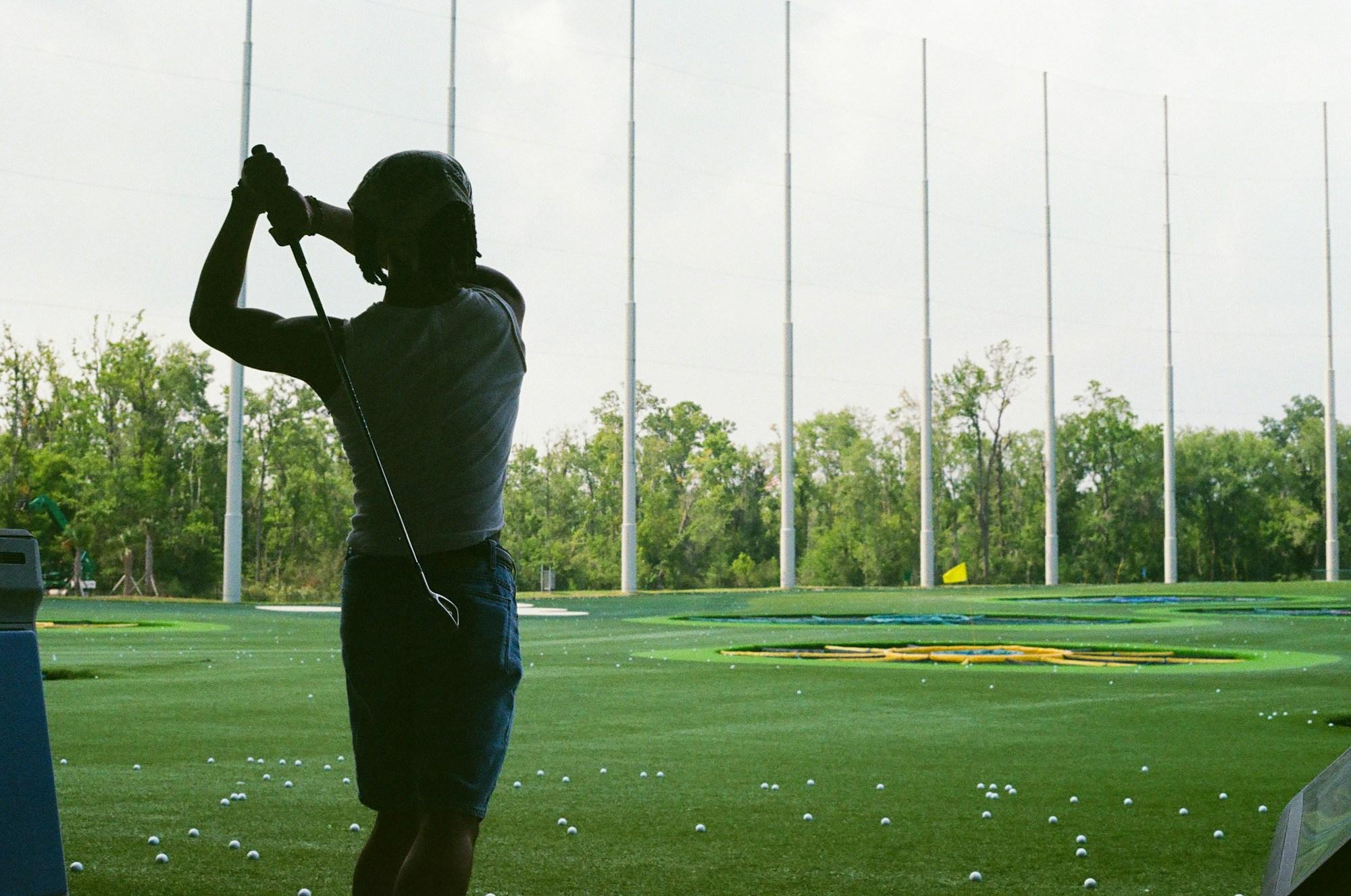 Golfer at a driving range